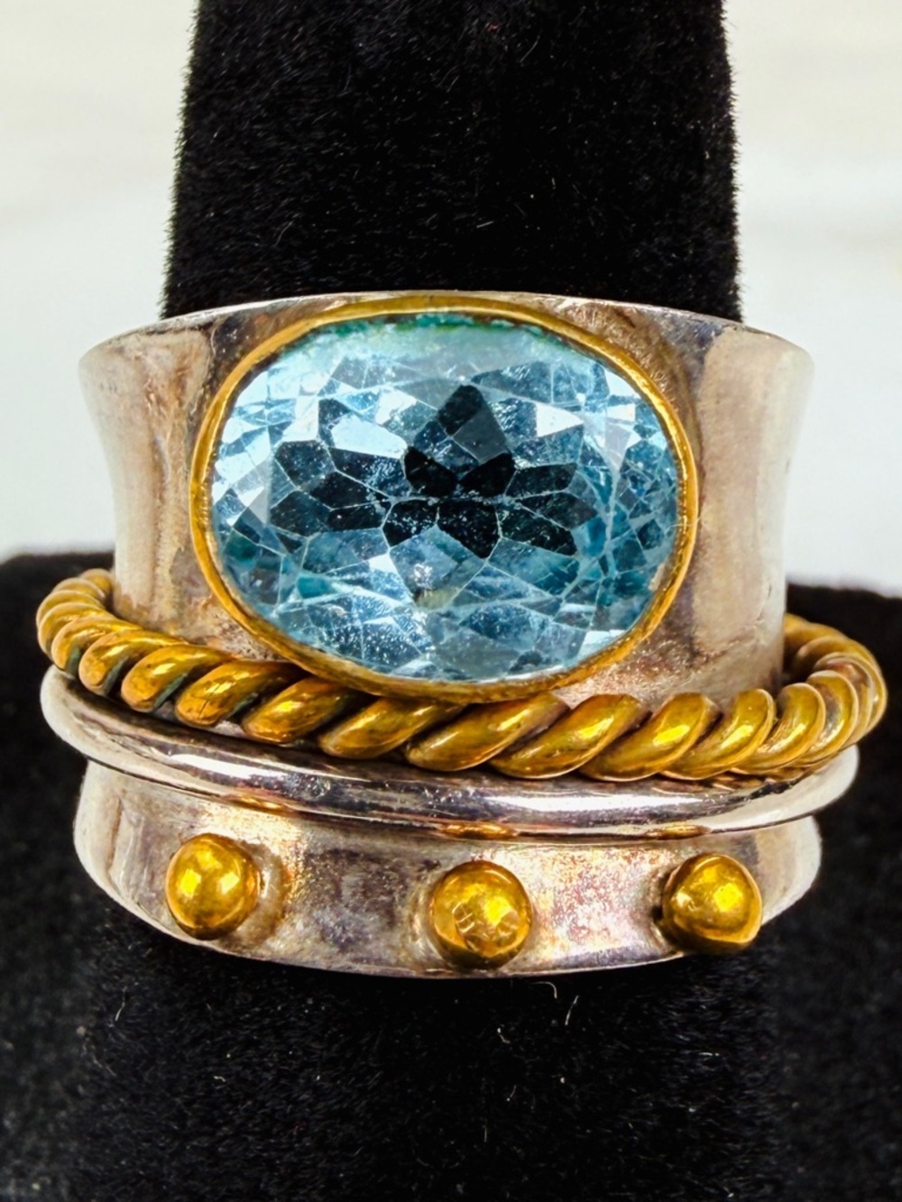 Beautiful size 5 1/2 Silvertone and bronze stamped 925 blue topaz, spinner ring